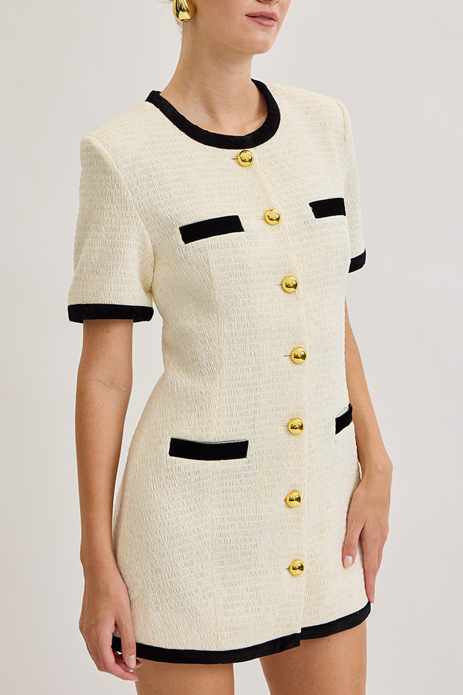 Designed to transition effortlessly from day to evening, this dress embodies understated glamour—perfect for elevated city dressing, soirées, and refined occasions.