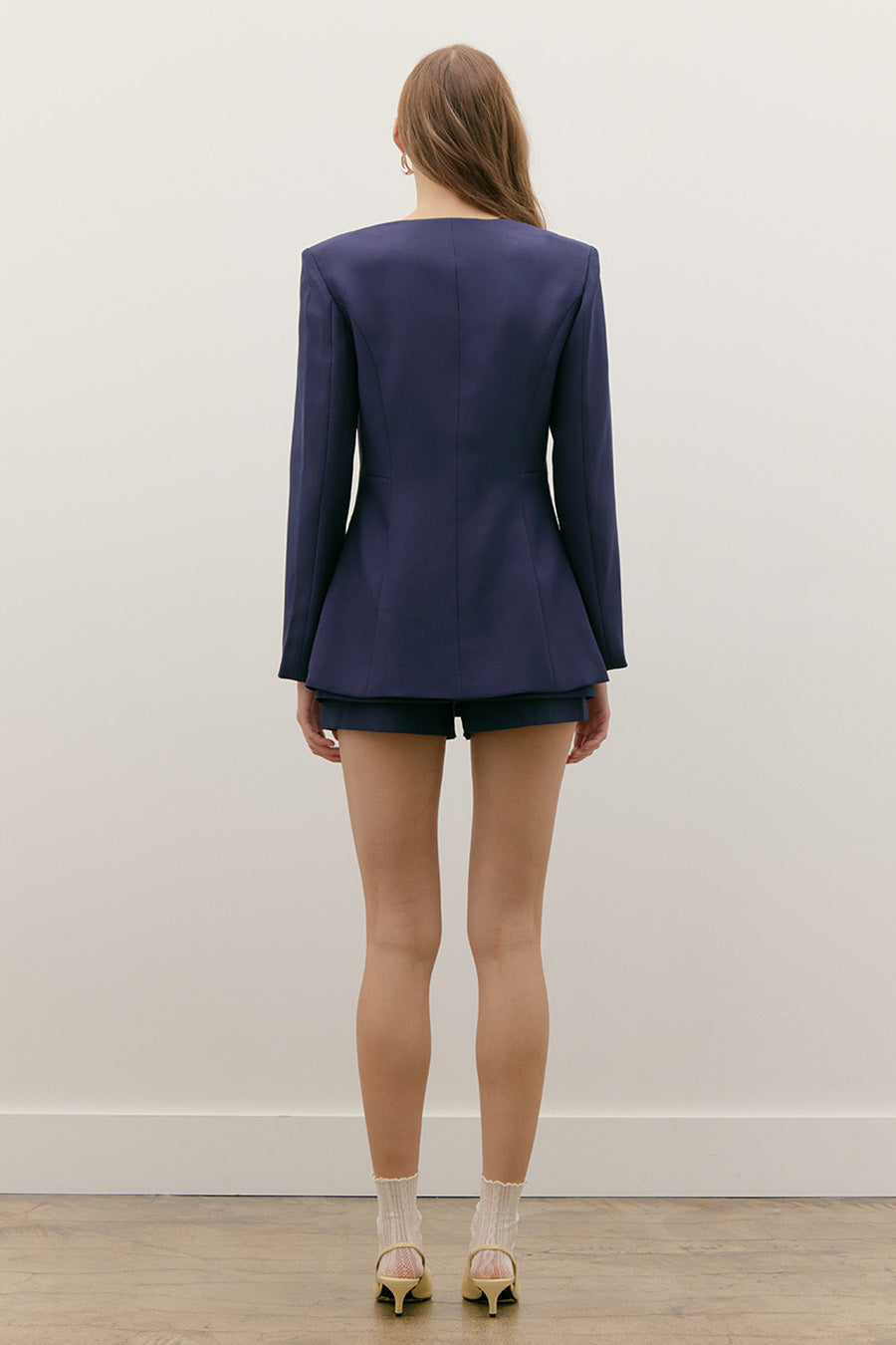 Crafted to transition seamlessly from day to evening, it embodies contemporary luxury with timeless appeal.