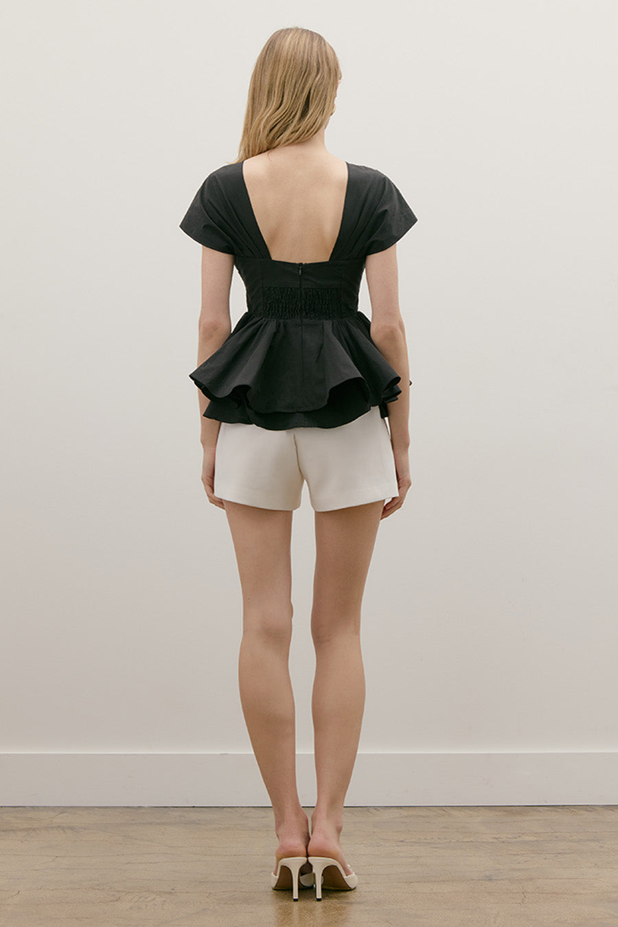 The result is a statement piece that feels both timeless and contemporary—effortlessly transitioning from day to evening.