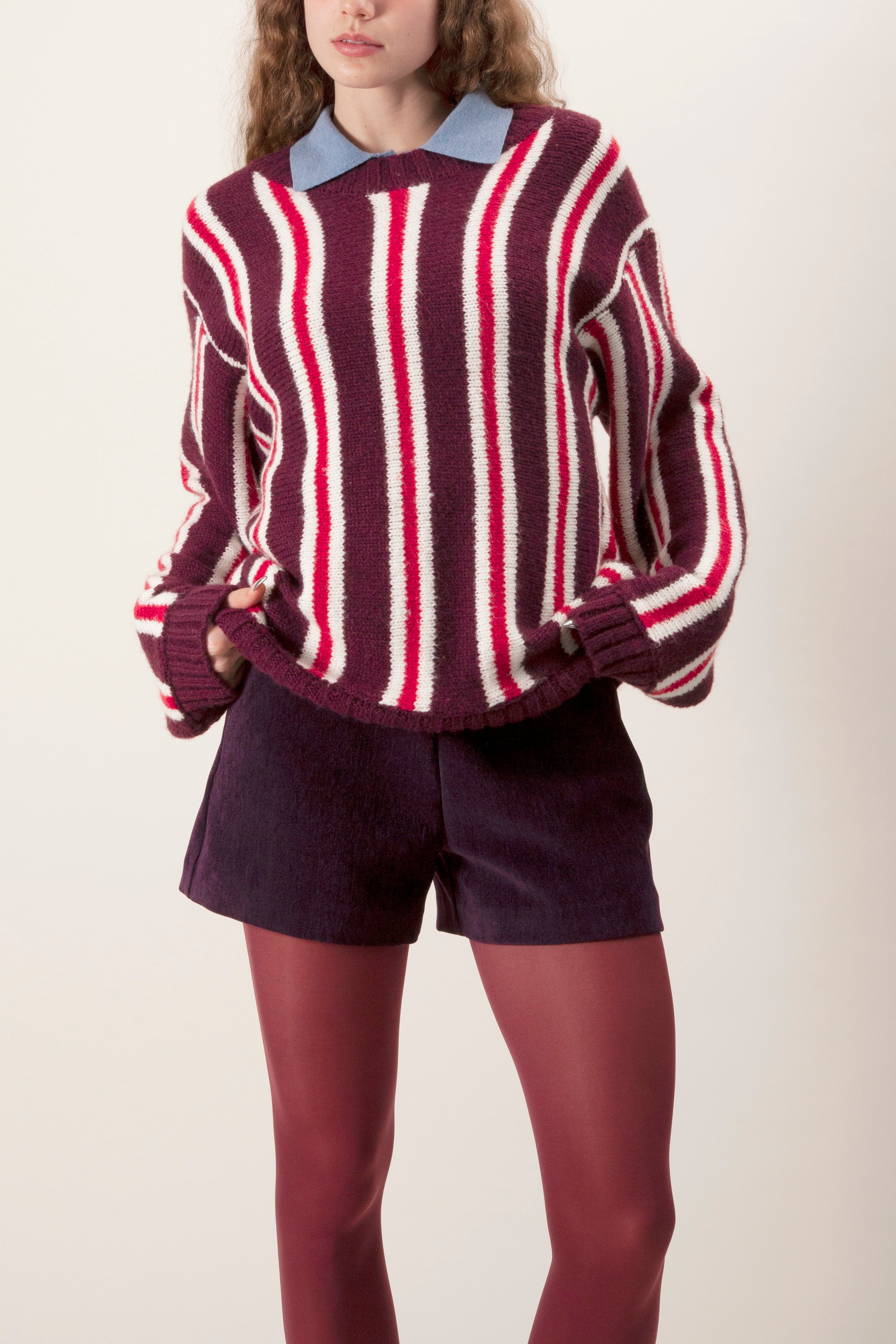 Ribbed cuffs and hem provide structure and durability, while the classic crew neckline makes it easy to style over collared shirts or wear on its own.