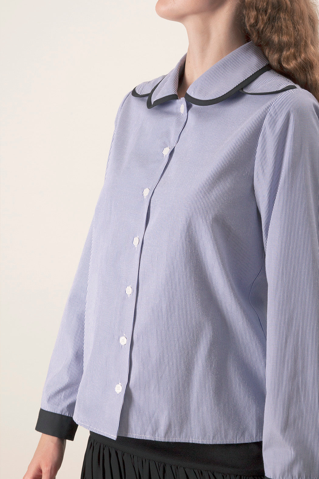 Clean lines and precise tailoring create a polished yet expressive piece that transitions effortlessly from elevated daywear to contemporary evening styling