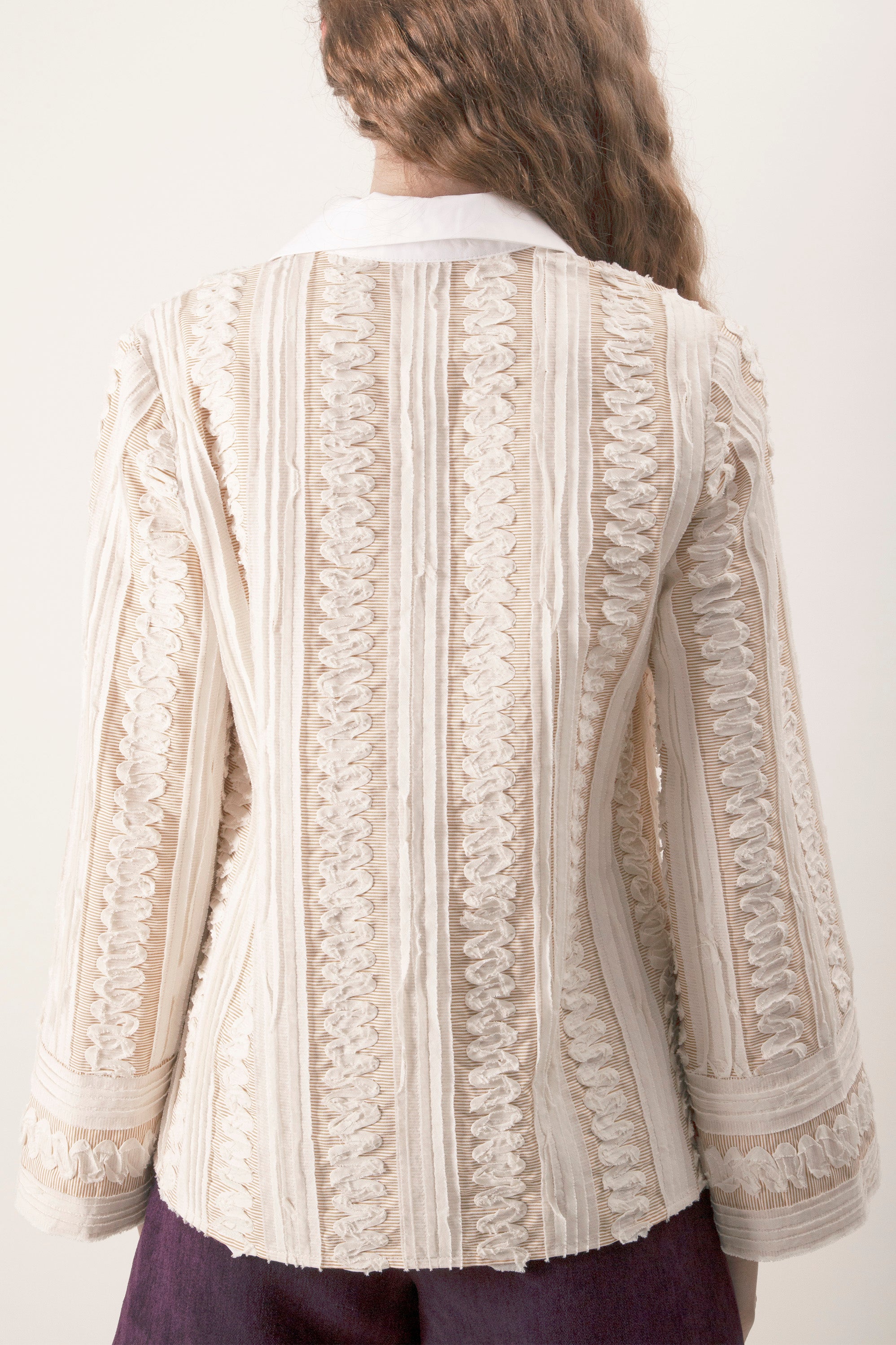 Lightweight yet polished, this blouse transitions seamlessly from elevated daytime dressing to refined evening styling.