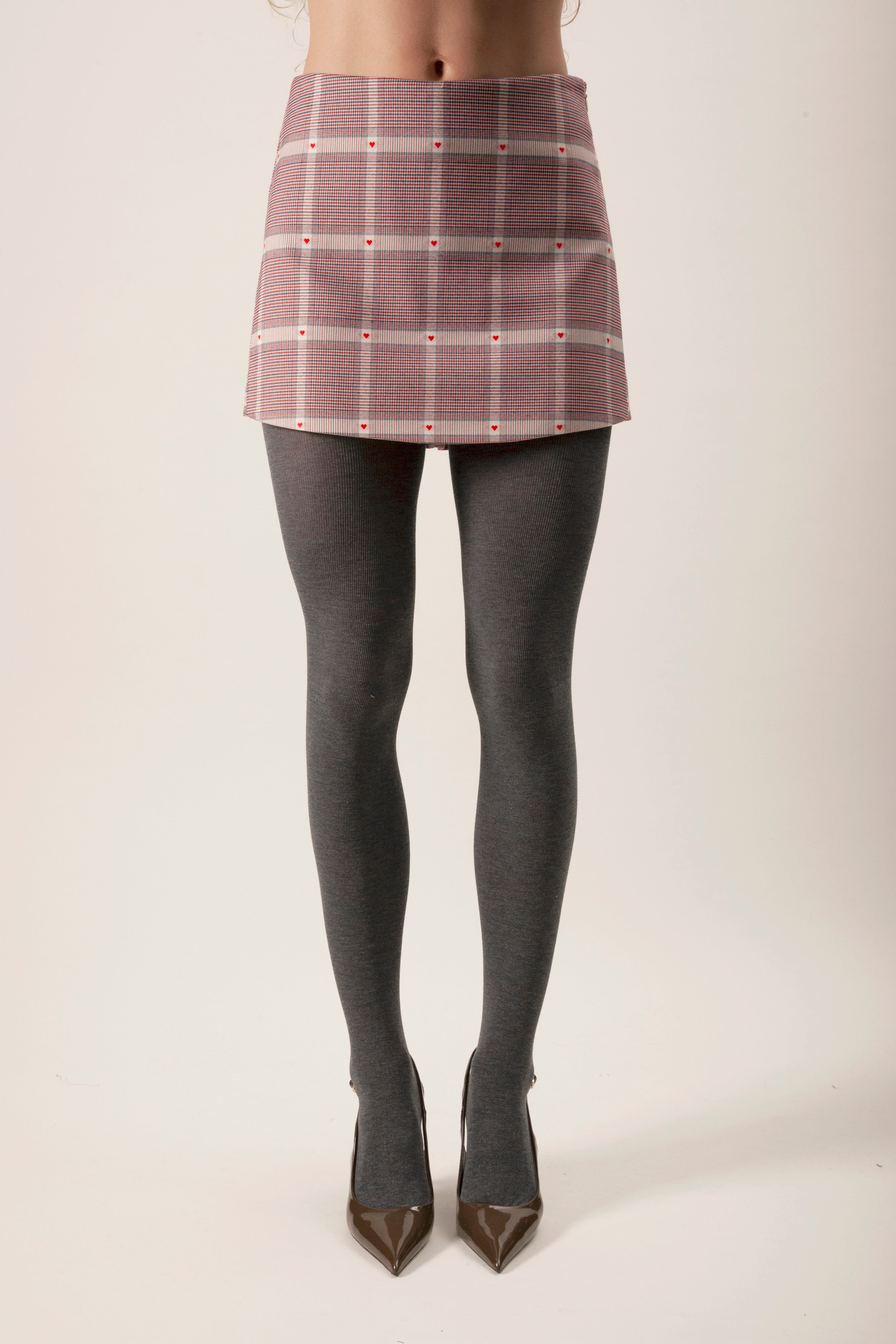 tailored mini skirt with woven plaid pattern and delicate heart motif detailing