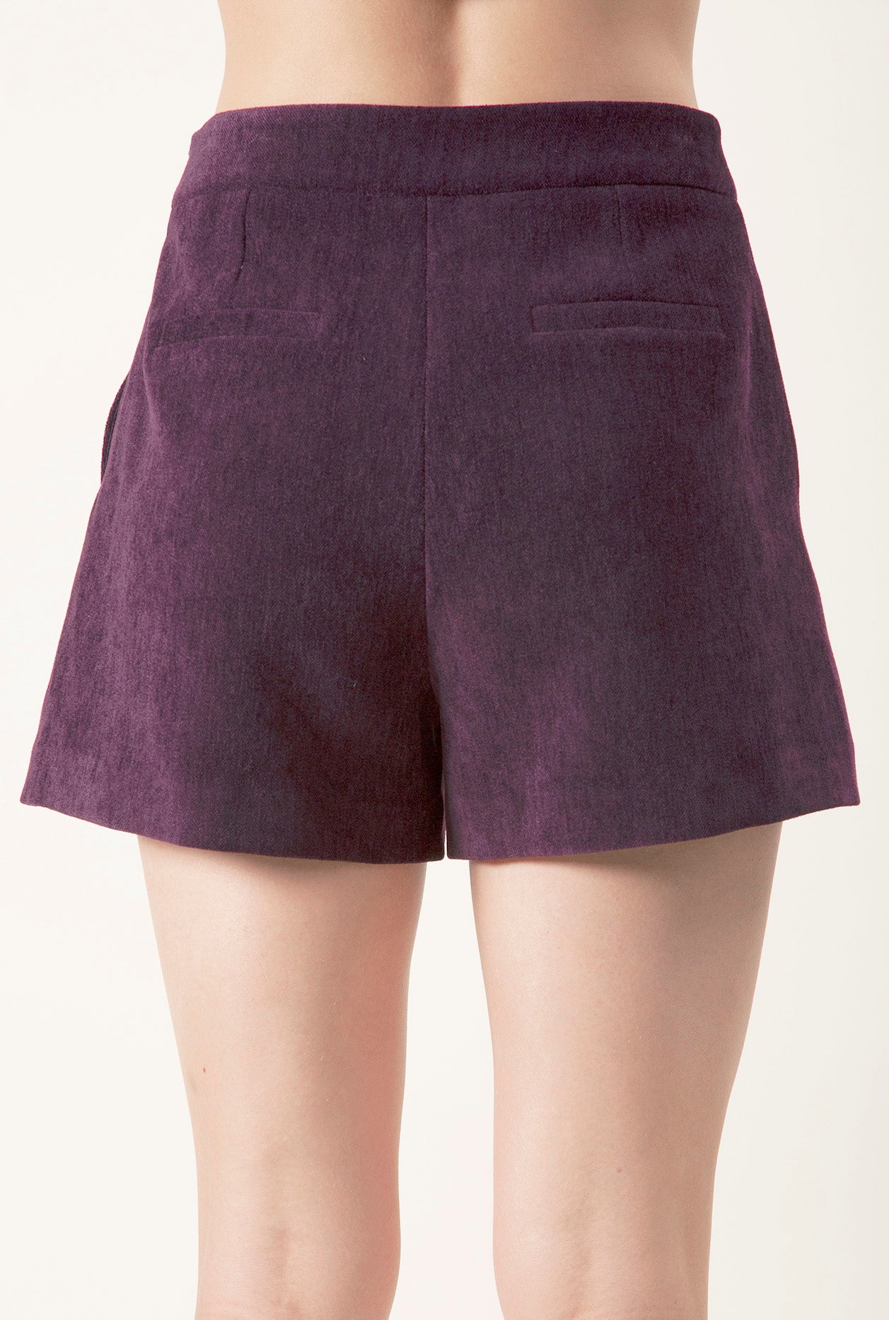 Subtle paneling enhances the fit, creating a flattering, architectural shape that feels both modern and timeless.