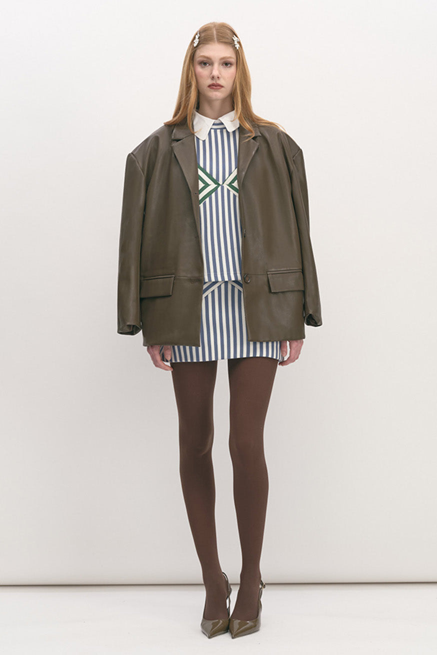 tailored to the leather blazer-style jacket shown in the image, with a refined modern-heritage aesthetic