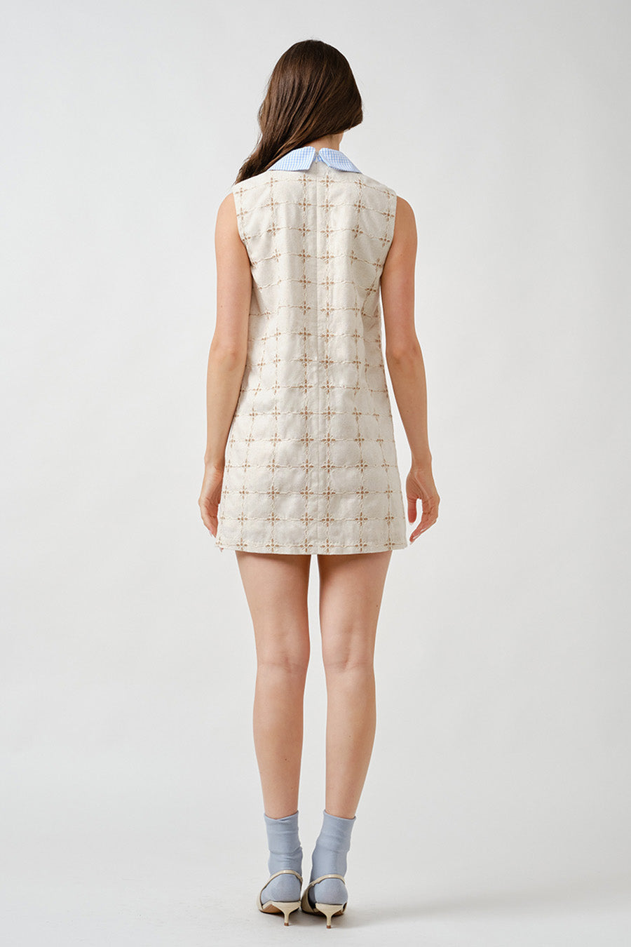 Effortlessly chic and versatile, this dress transitions seamlessly from daytime engagements to elevated evening moments.