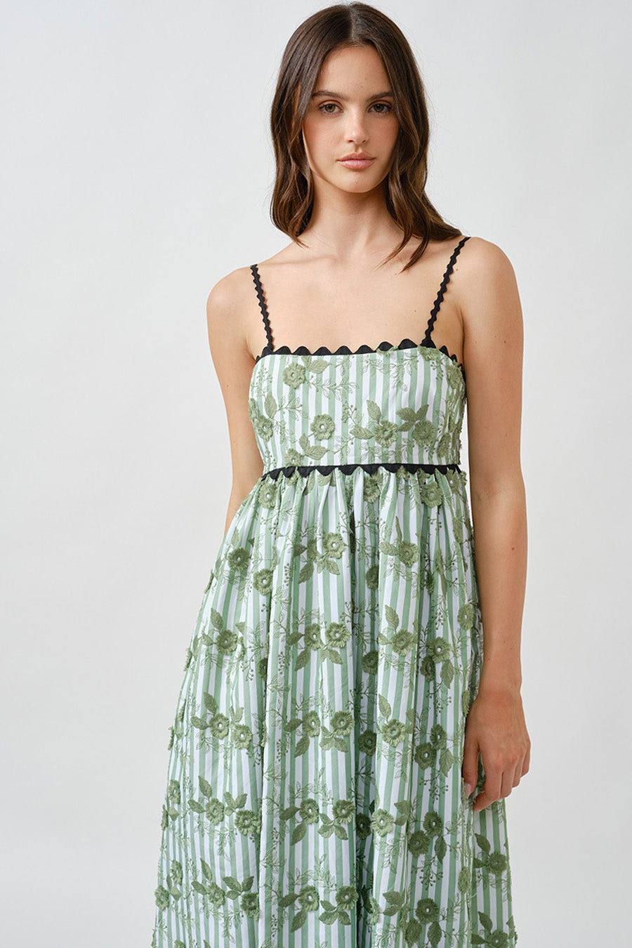 Light and airy, this dress is ideal for sunlit gatherings, garden events, or elevated resort occasions.