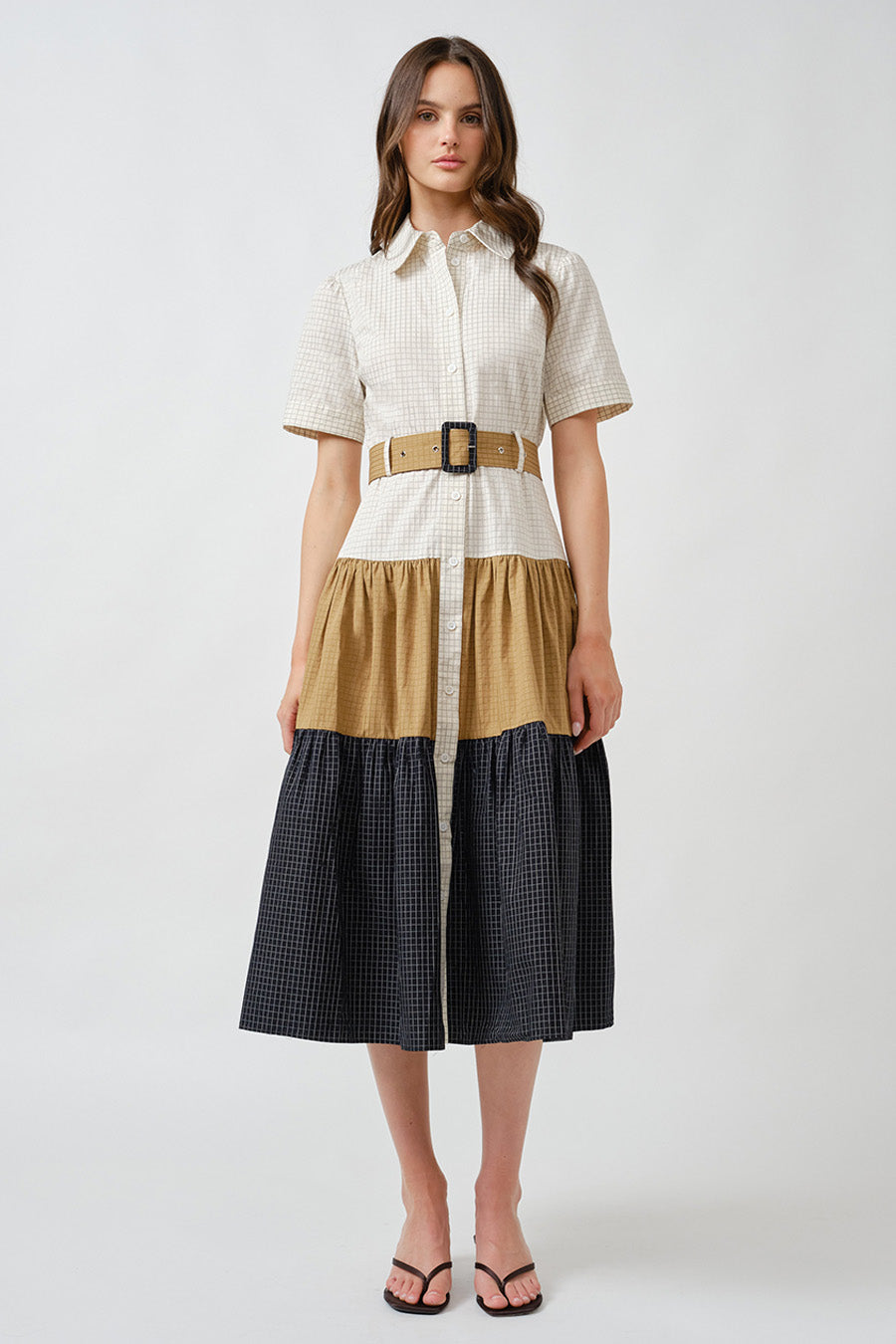 A sophisticated fusion of tailoring and relaxed elegance, this luxury midi shirt dress is designed for modern, effortless refinement