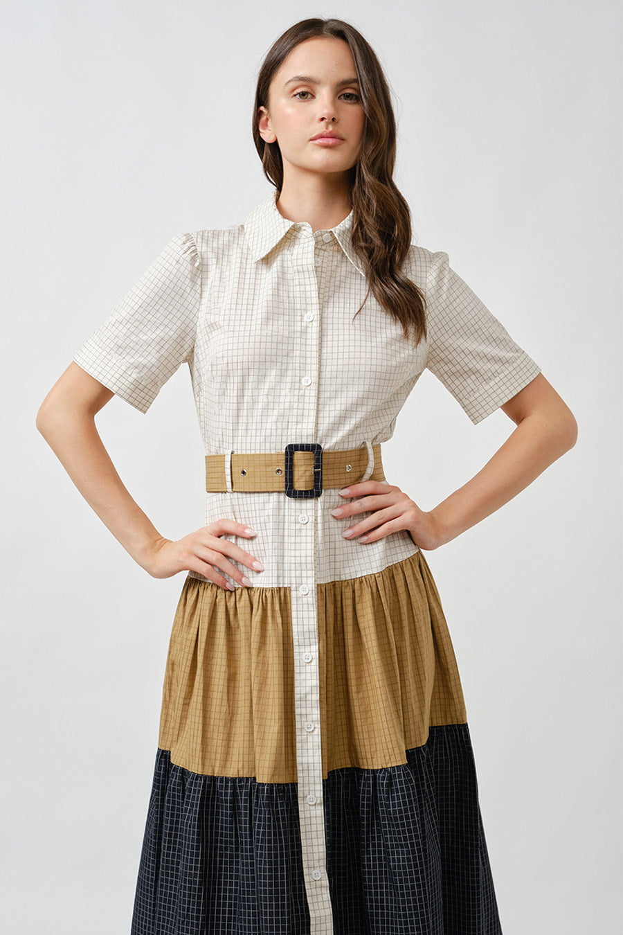 Thoughtful proportions and fluid movement make this dress ideal for polished daytime wear, city outings, or elevated resort styling.