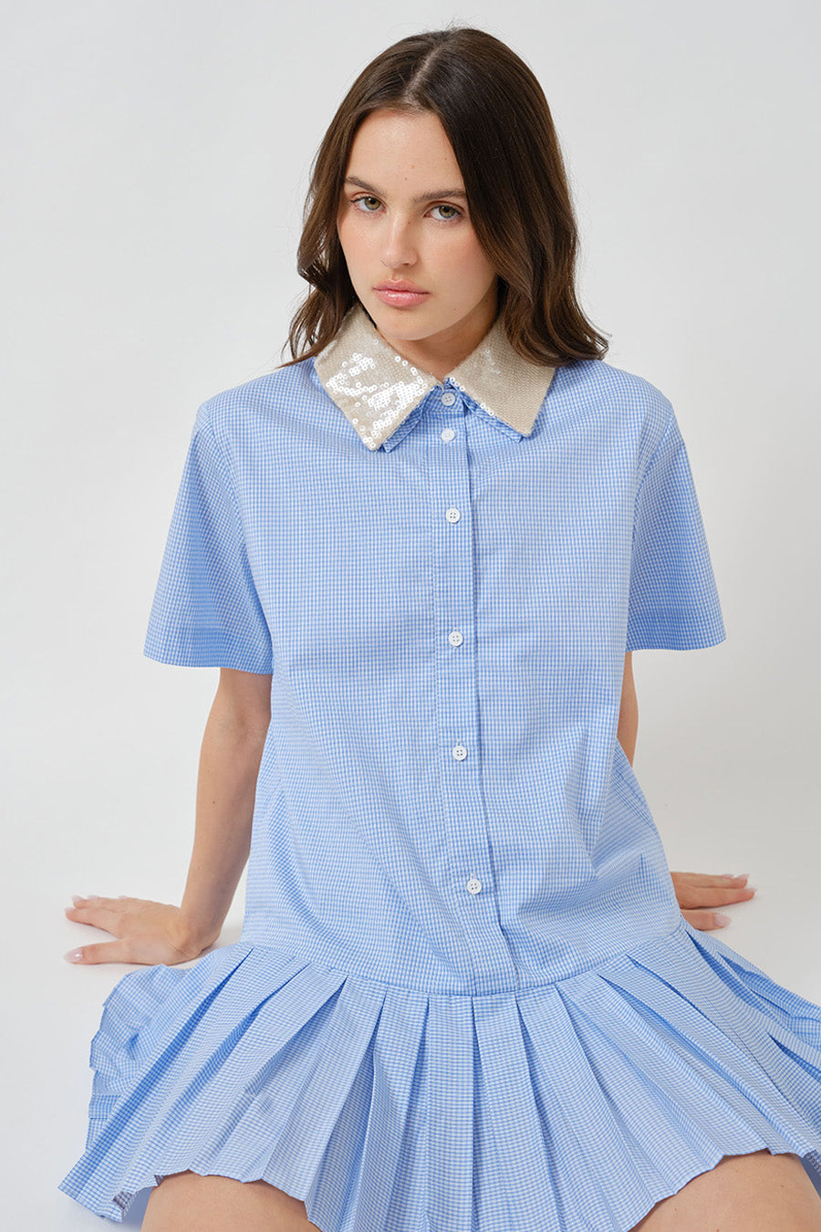 Effortlessly versatile, this piece transitions seamlessly from daytime refinement to elevated casual dressing.