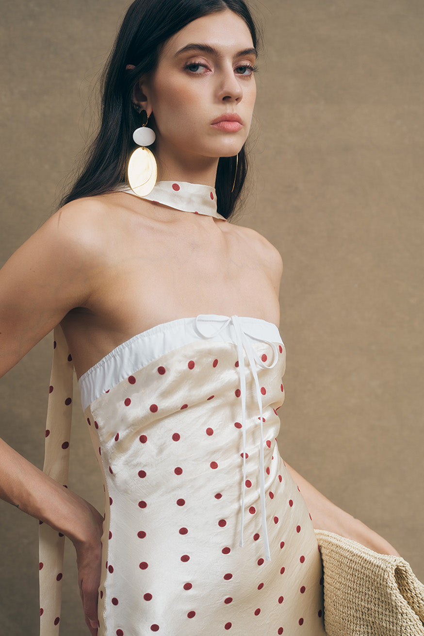 An exquisite expression of modern romance, this piece is ideal for refined resort wear, summer soirées, and elevated daytime occasions.