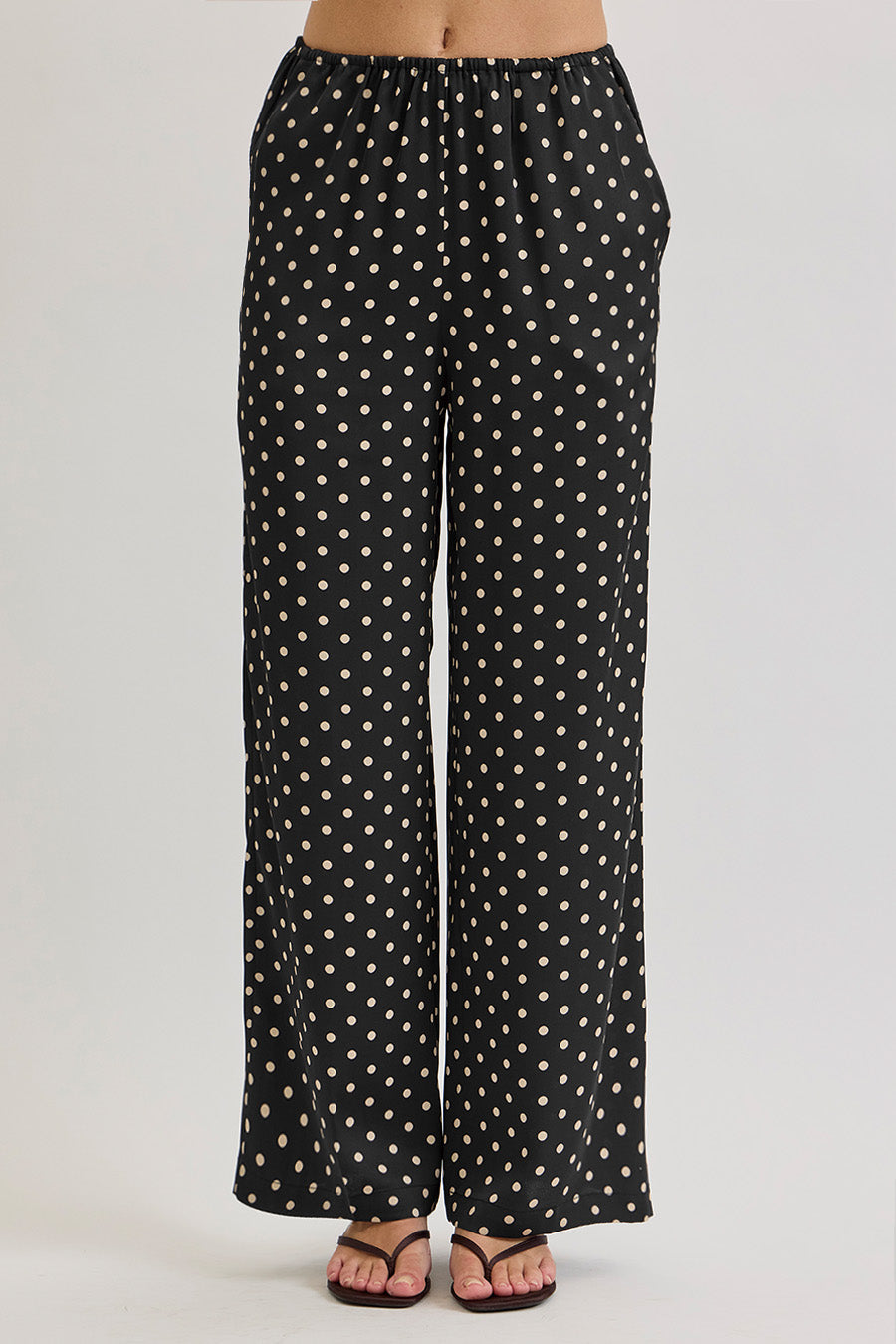 A refined expression of relaxed luxury, these wide-leg pants are designed in a fluid silhouette that moves with effortless elegance