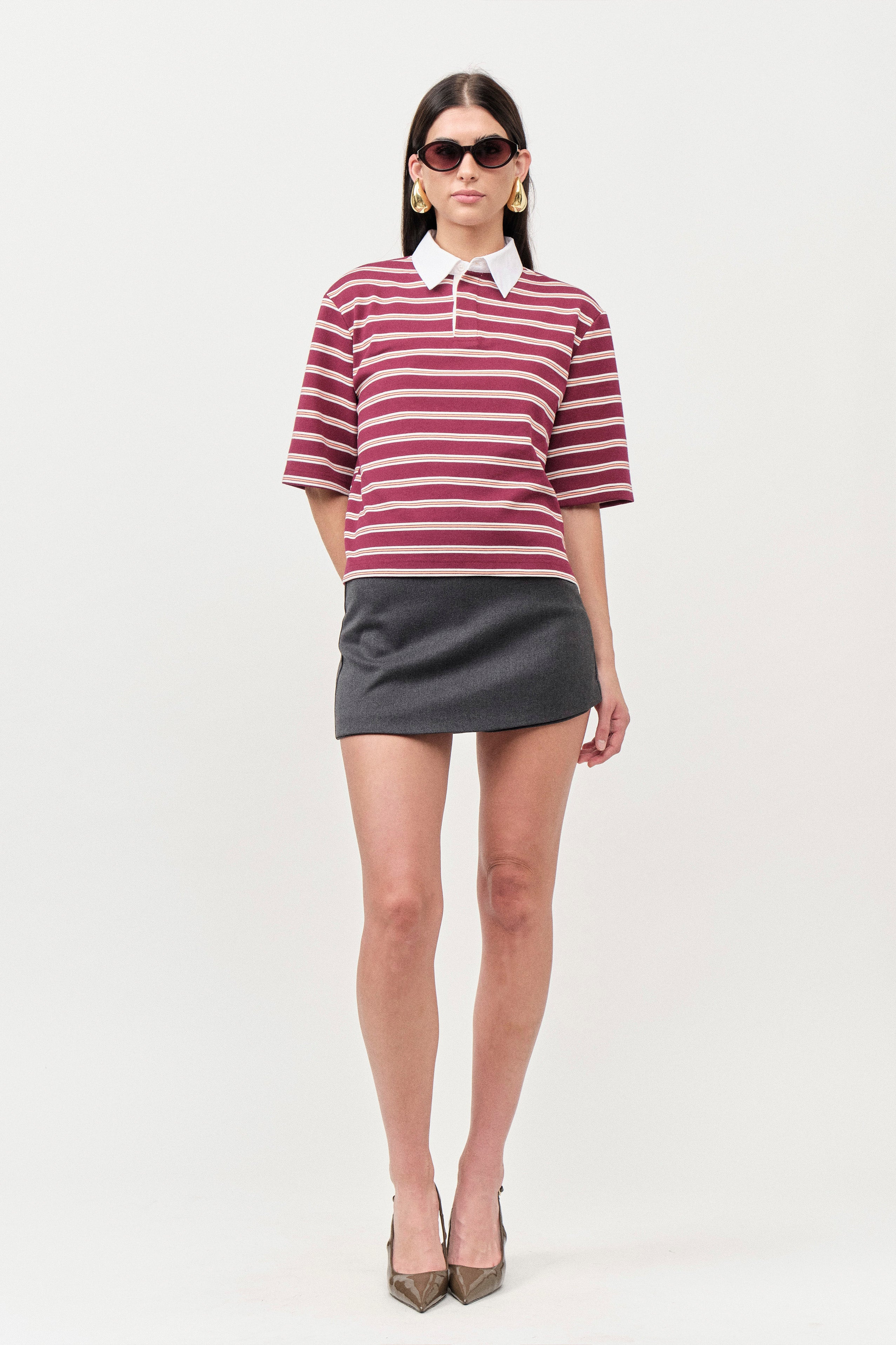 A refined take on casual sophistication, this luxury short-sleeve top blends relaxed ease with polished detailing