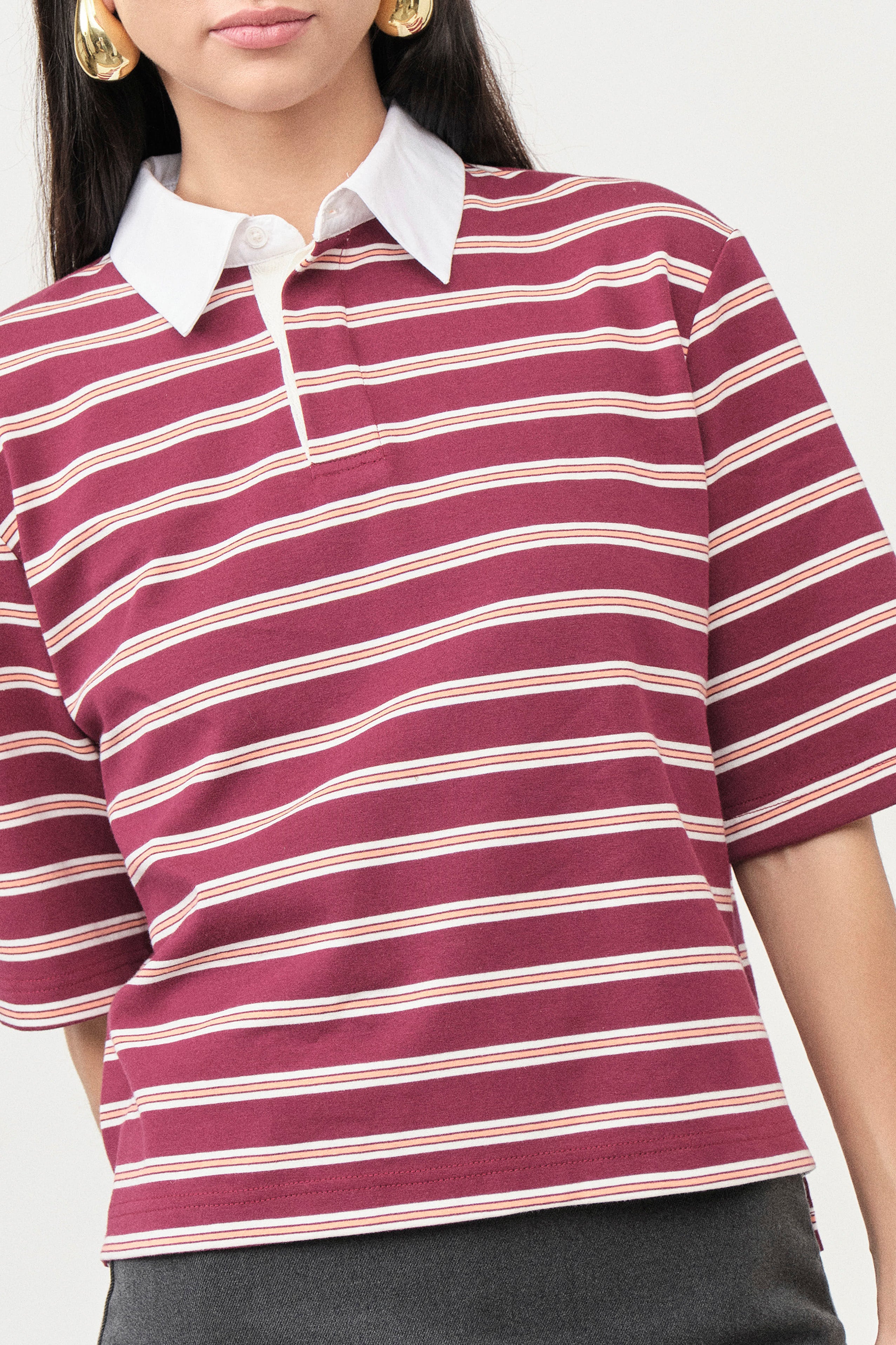 Designed to transition seamlessly from everyday styling to elevated casual looks, this top pairs beautifully with tailored skirts or relaxed trousers.