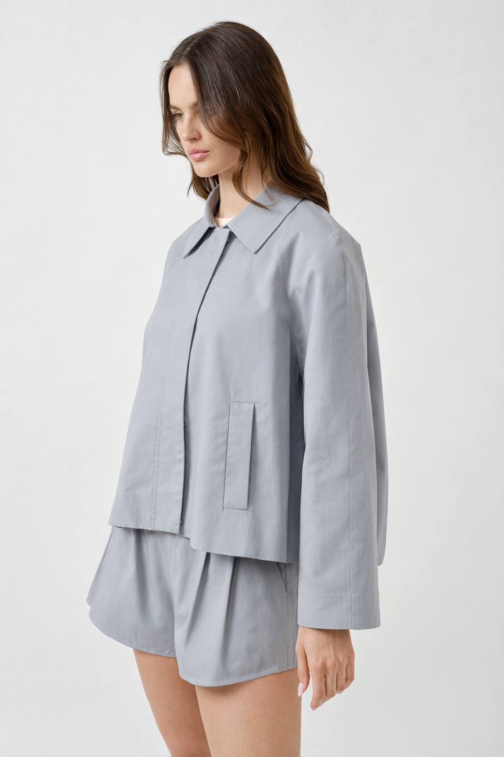 Designed with a clean silhouette and structured tailoring, this versatile piece features a soft matte finish,