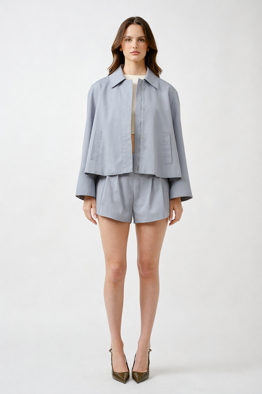 Perfect for layering over day-to-evening looks, this jacket embodies contemporary luxury with timeless appeal.