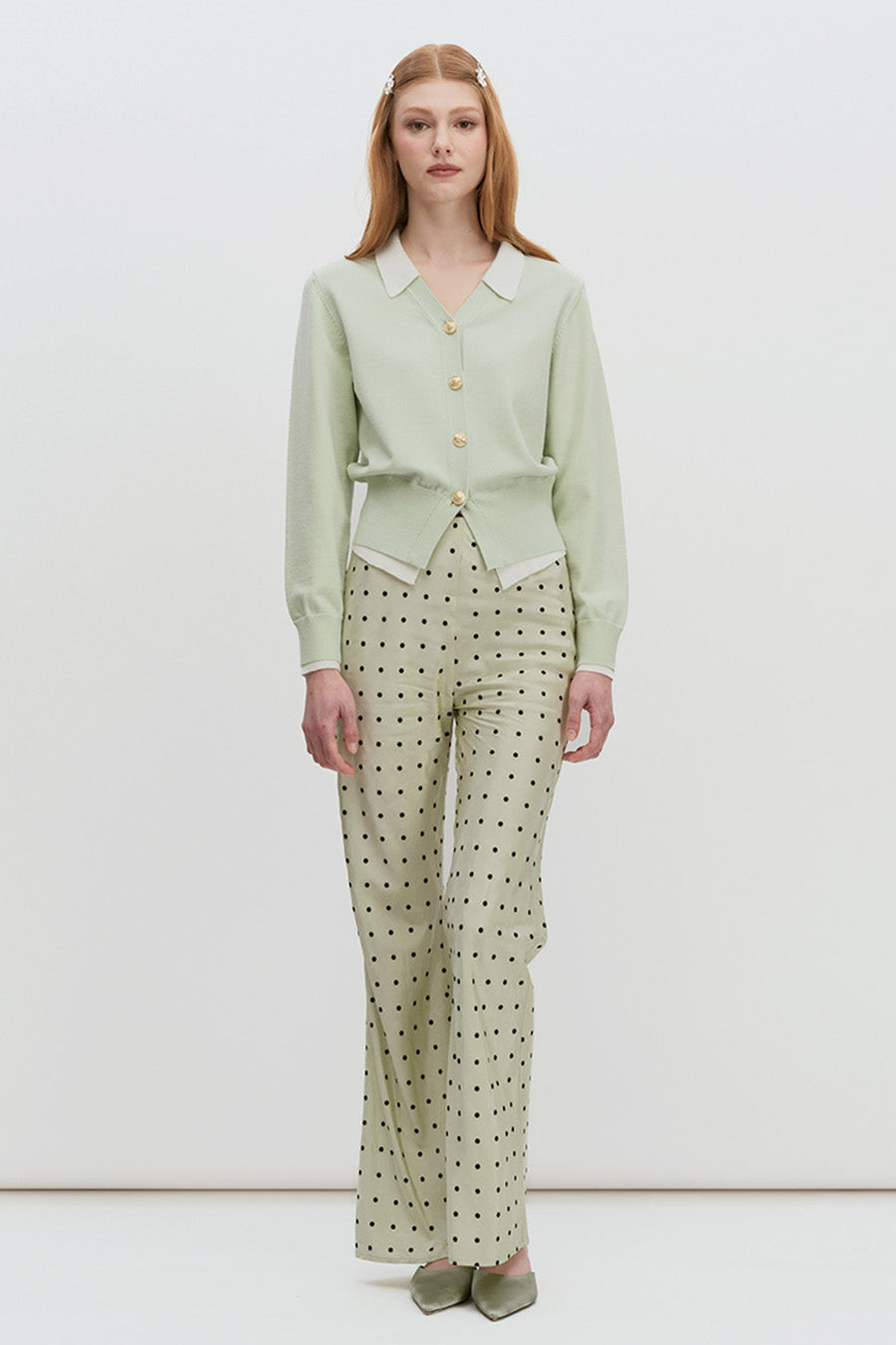 A modern classic elevated through thoughtful design, these luxury tailored pants are crafted in a refined fabric adorned with delicate polka dots for a subtle statement