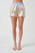 A playful expression of modern glamour, these sequin shorts are designed to shine with effortless sophistication.