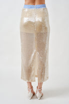 Elevated yet wearable, it transitions seamlessly from evening occasions to contemporary daytime styling when paired with tailored or textural separates.