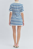 Crafted from a premium stretch-knit fabric, it offers a flattering silhouette that moves comfortably with you.