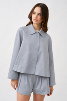 Elevate your everyday wardrobe with this refined light grey jacket, crafted for modern sophistication.